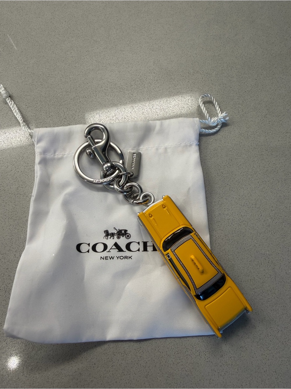 COACH Yellow Taxi Car bag charm